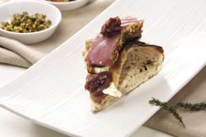 un trancio di pizza gourmet da TasteIT