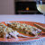 Ricetta della spigola alla vernaccia di Oristano